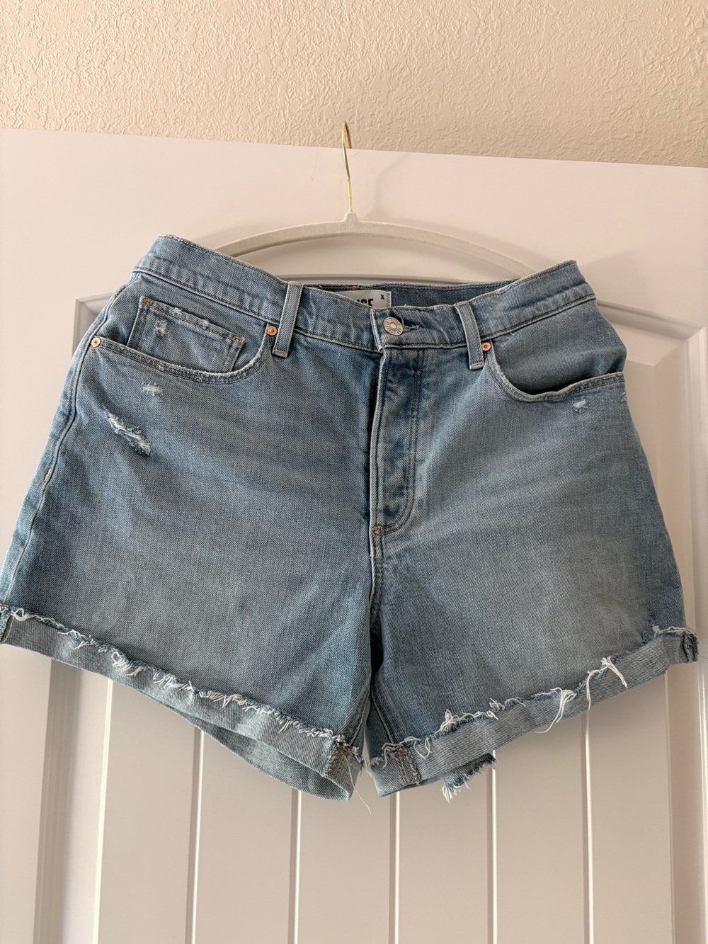 PAIGE Light Wash Distressed Denim Cutoff Shorts